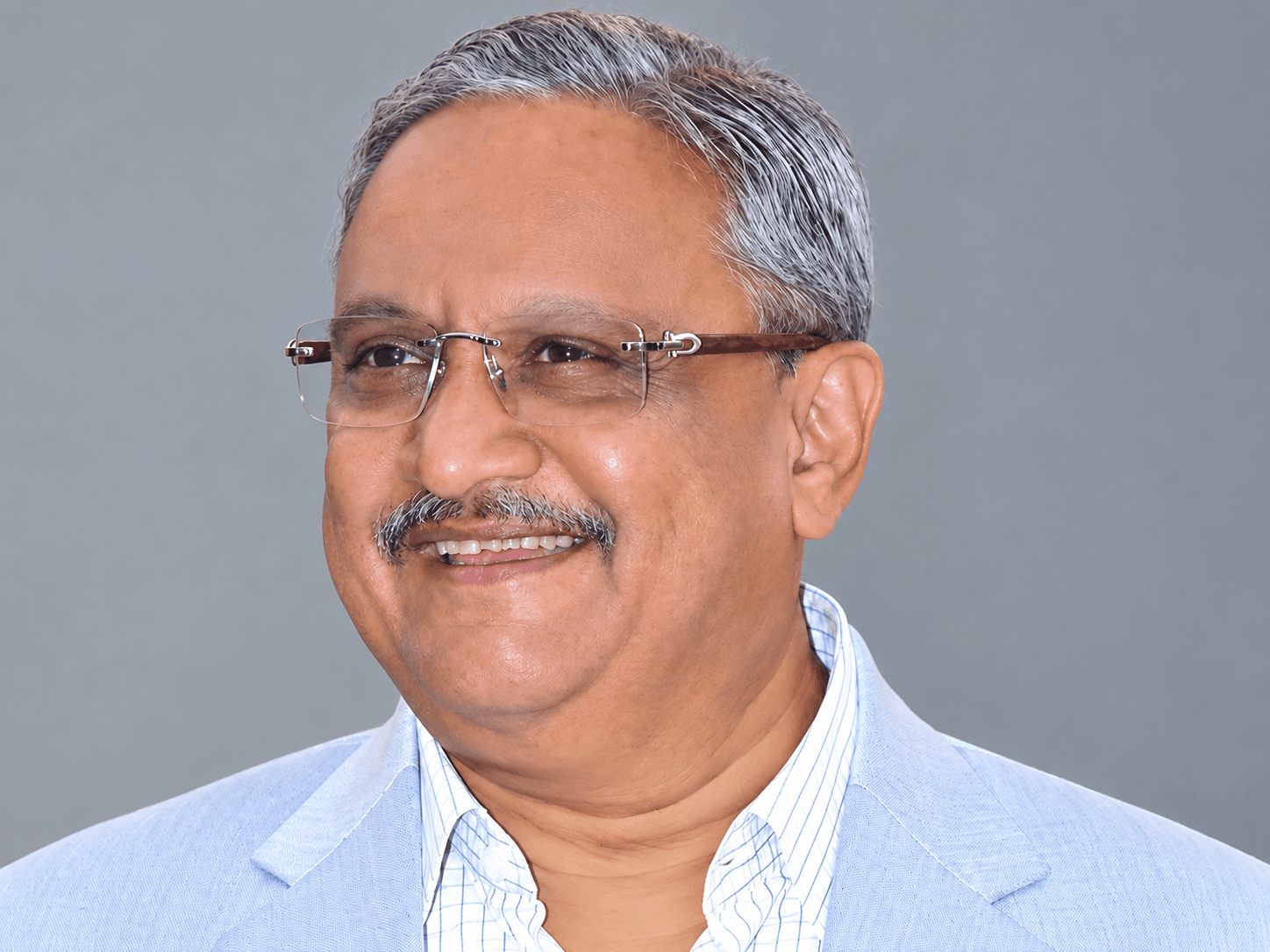 Shri Amrishbhai Patel, President, SVKM